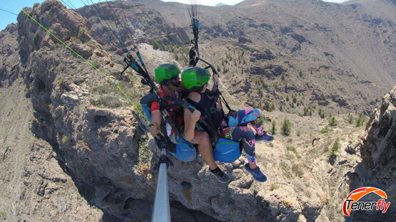 Exciting paragliding flight over the majestic Ifonche Summit in Tenerife.