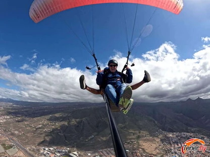 Experience the excitement and beauty from above while paragliding over Adeje in Tenerife